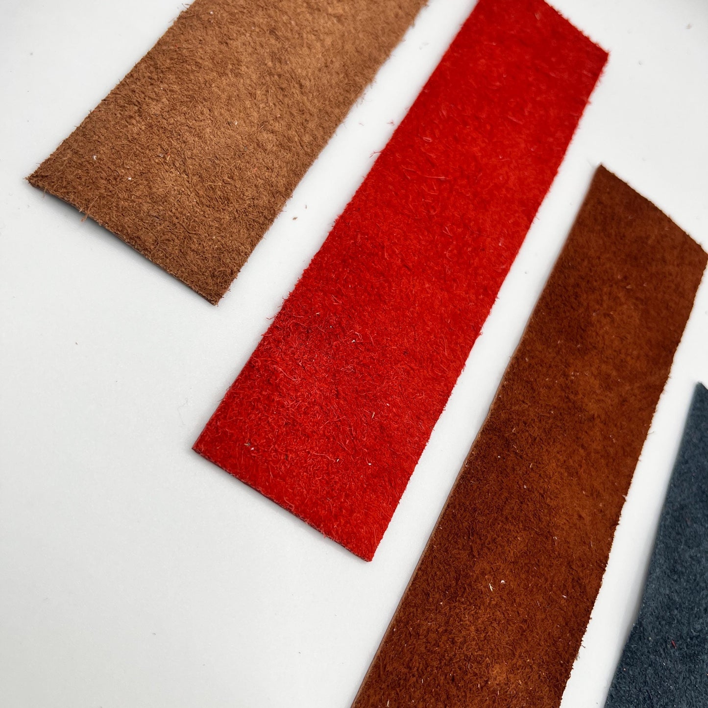 Handmade upcycled Italian leather bookmark cut from upholstery-grade leather scraps, slim durable page marker with natural grain, sustainable gift for readers and book lovers