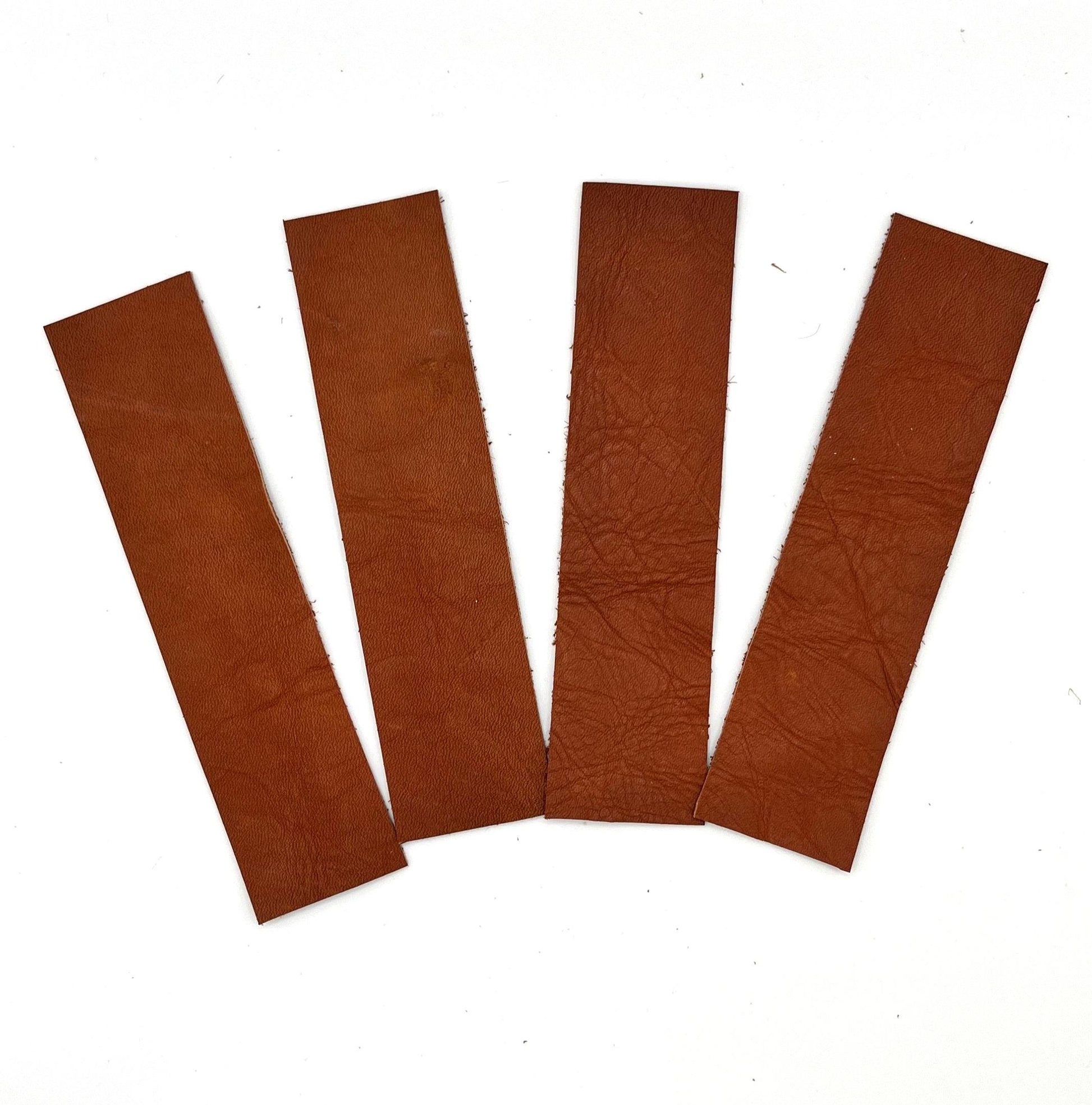 Handmade upcycled Italian leather bookmark cut from upholstery-grade leather scraps, slim durable page marker with natural grain, sustainable gift for readers and book lovers