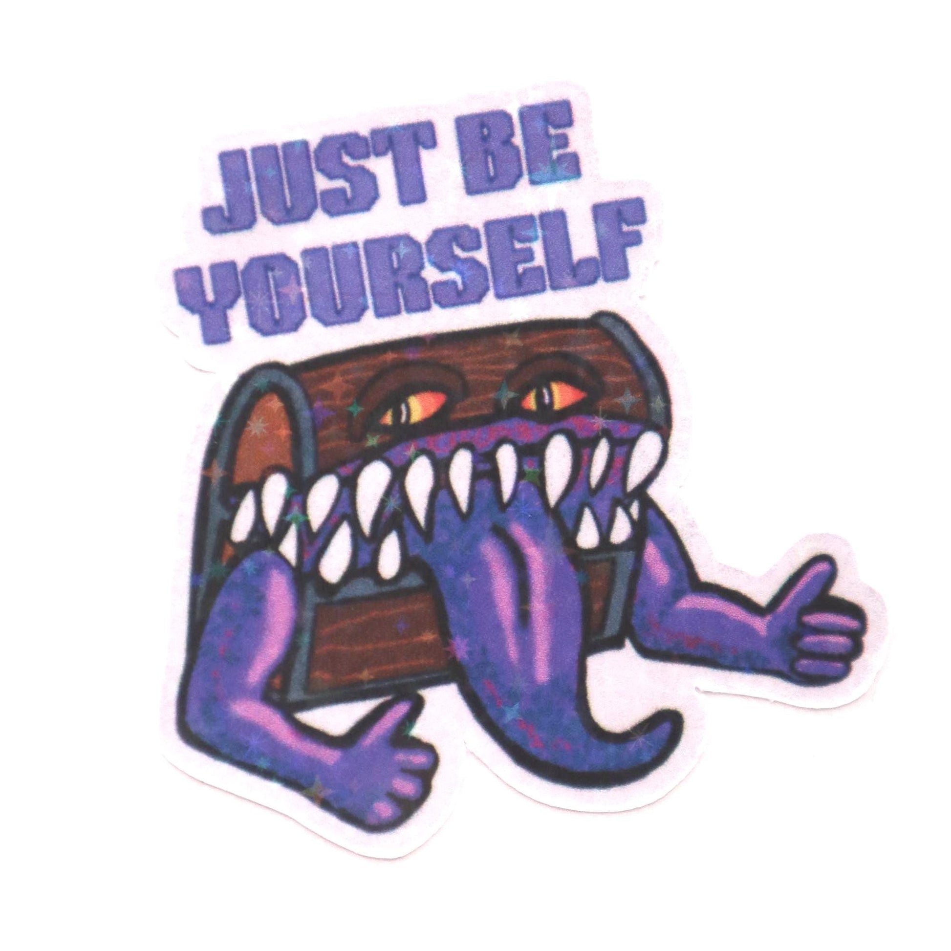Holographic DnD mimic sticker with a grinning treasure chest and the phrase Just Be Yourself, perfect for laptops, water bottles, and tabletop RPG fans.