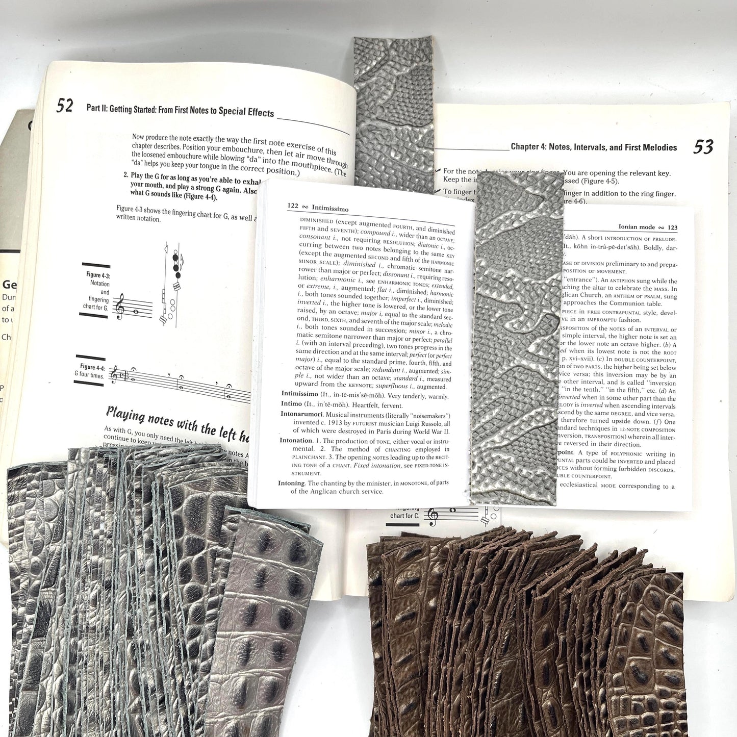 Handmade upcycled Italian leather bookmark cut from upholstery-grade leather scraps, slim durable page marker with natural grain, sustainable gift for readers and book lovers