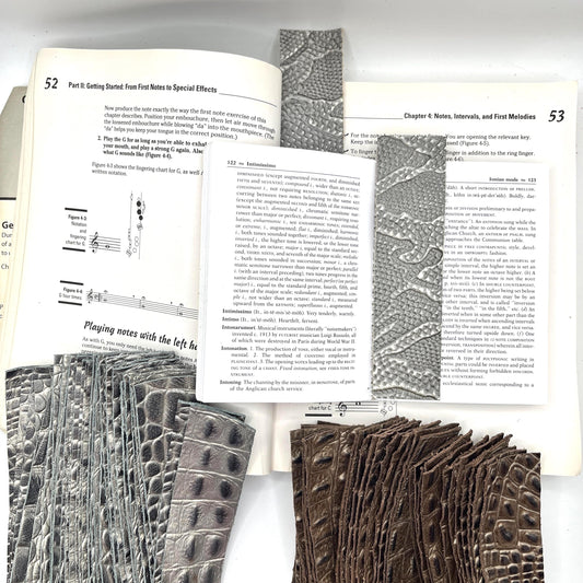 Handmade upcycled Italian leather bookmark cut from upholstery-grade leather scraps, slim durable page marker with natural grain, sustainable gift for readers and book lovers
