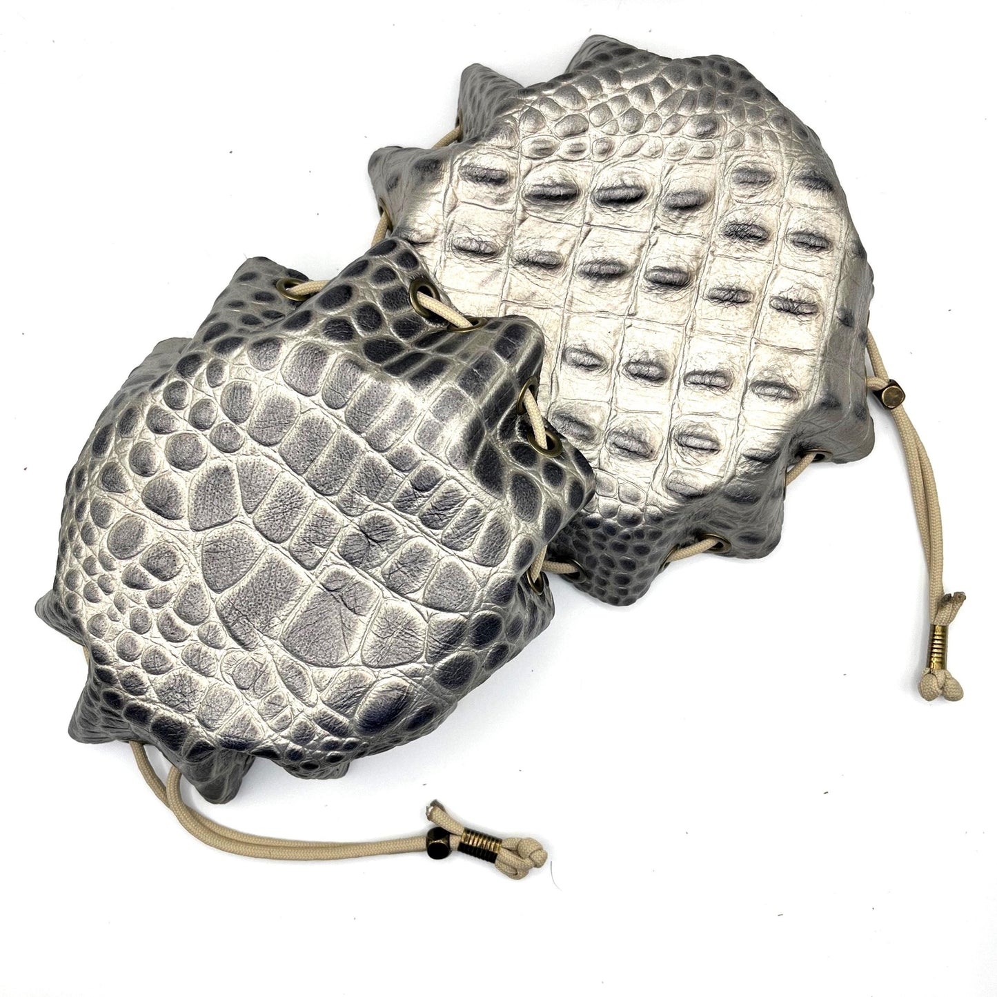 Handcrafted leather dice bag with drawstring, ideal for storing RPG dice sets. Perfect for DnD, tabletop games, or as a fantasy gift for gamers.
