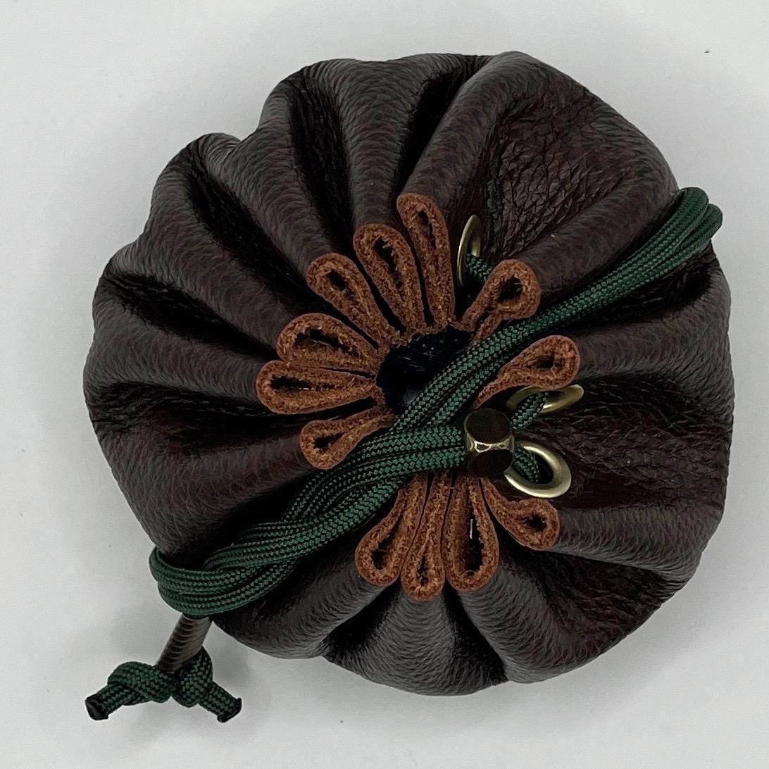 Handcrafted leather dice bag with drawstring, ideal for storing RPG dice sets. Perfect for DnD, tabletop games, or as a fantasy gift for gamers.