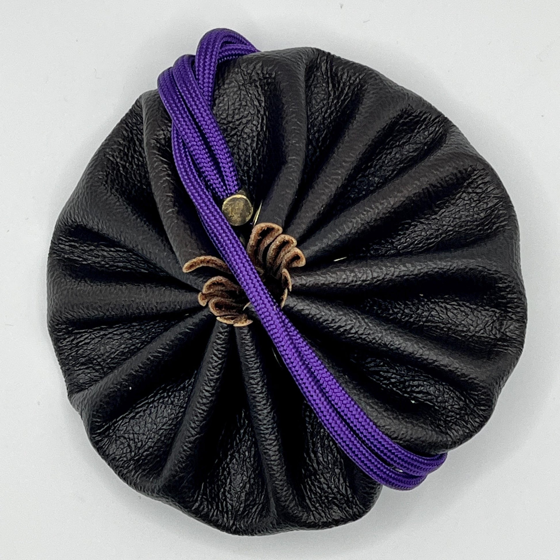 Handcrafted leather dice bag with drawstring, ideal for storing RPG dice sets. Perfect for DnD, tabletop games, or as a fantasy gift for gamers.