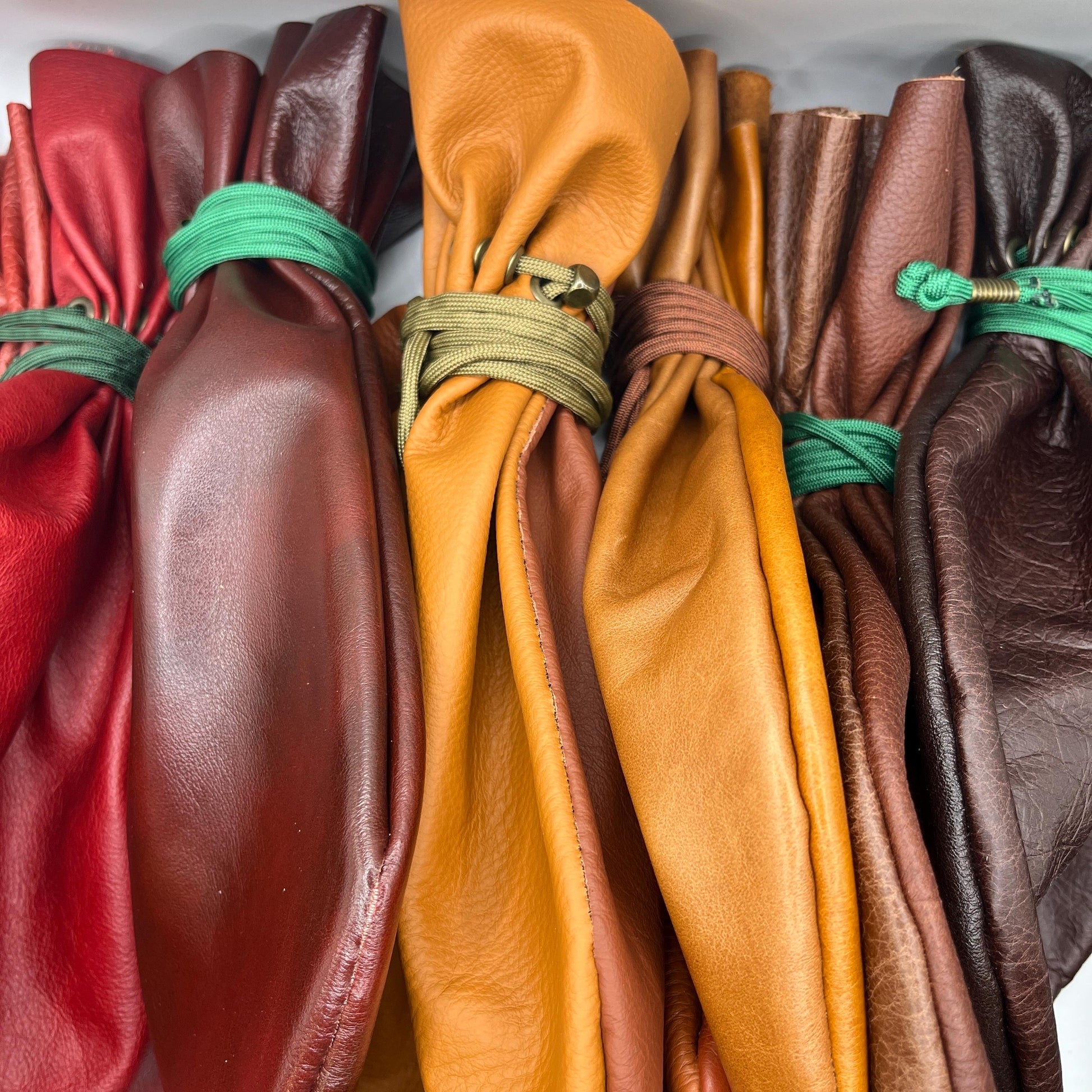 Handcrafted leather dice bag with drawstring, ideal for storing RPG dice sets. Perfect for DnD, tabletop games, or as a fantasy gift for gamers.