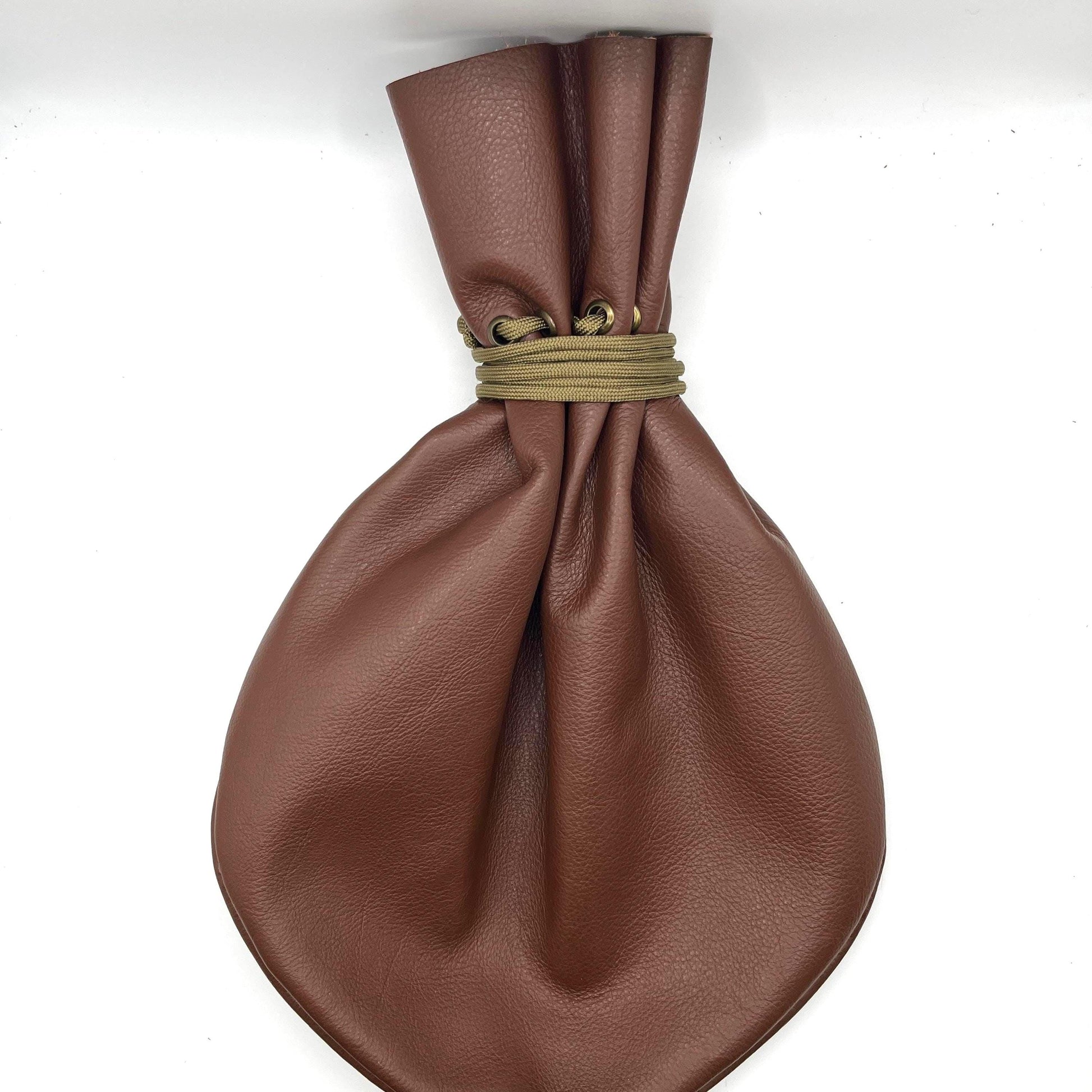 Handcrafted leather dice bag with drawstring, ideal for storing RPG dice sets. Perfect for DnD, tabletop games, or as a fantasy gift for gamers.