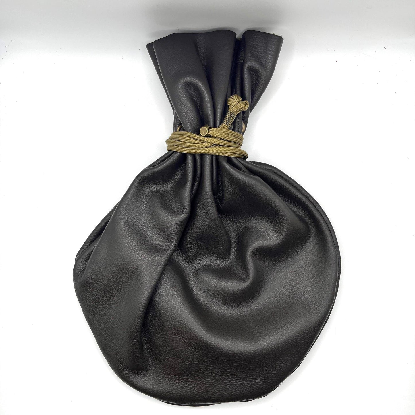Handcrafted leather dice bag with drawstring, ideal for storing RPG dice sets. Perfect for DnD, tabletop games, or as a fantasy gift for gamers.