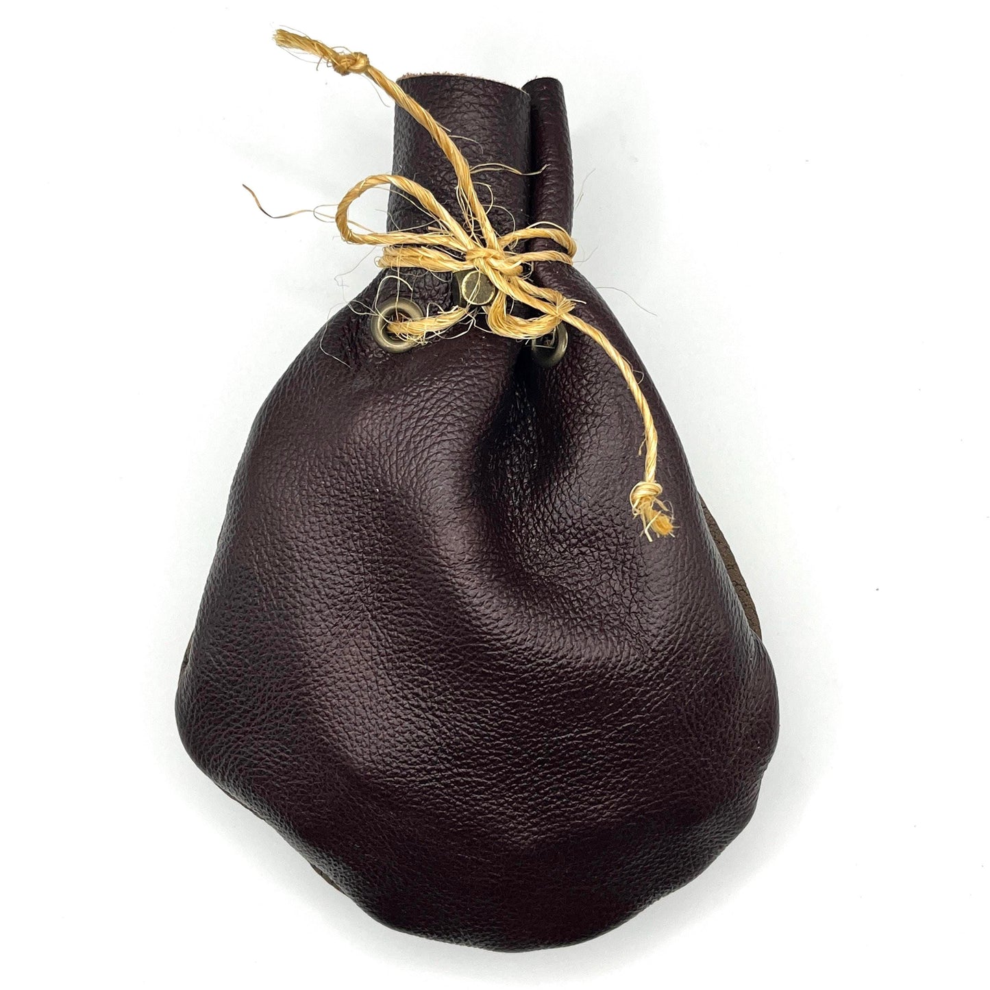 Handcrafted leather dice bag with drawstring, ideal for storing RPG dice sets. Perfect for DnD, tabletop games, or as a fantasy gift for gamers.