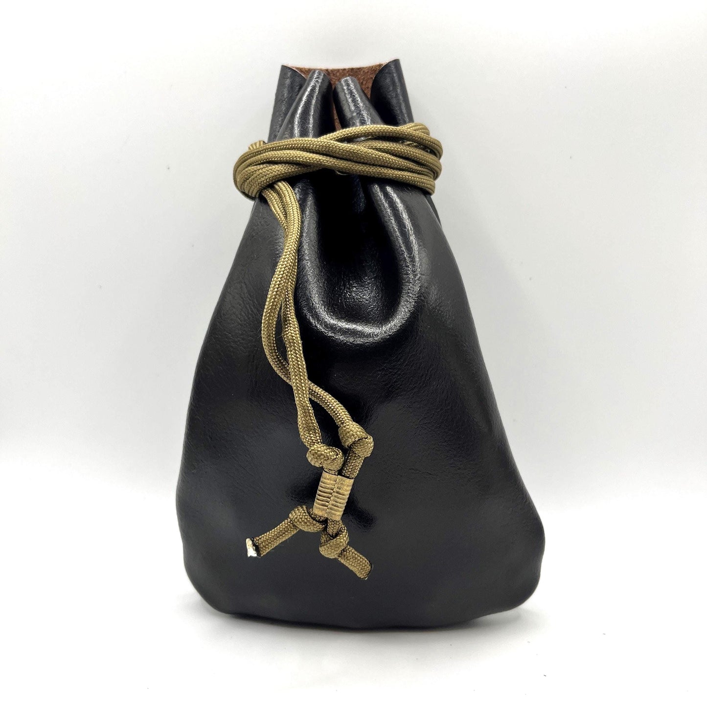 Handcrafted leather dice bag with drawstring, ideal for storing RPG dice sets. Perfect for DnD, tabletop games, or as a fantasy gift for gamers.