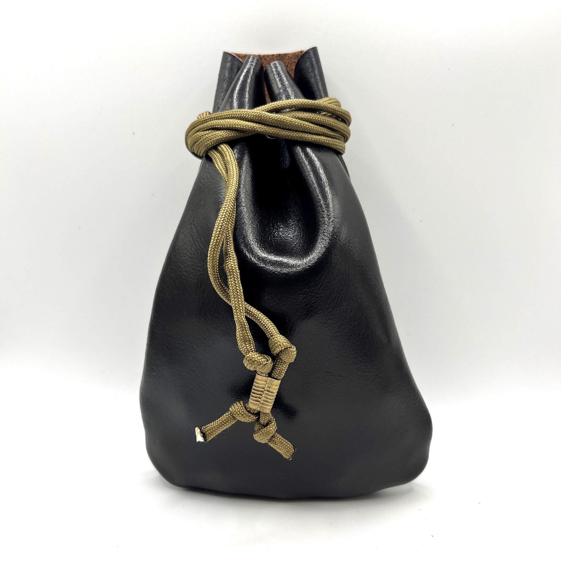Handcrafted leather dice bag with drawstring, ideal for storing RPG dice sets. Perfect for DnD, tabletop games, or as a fantasy gift for gamers.
