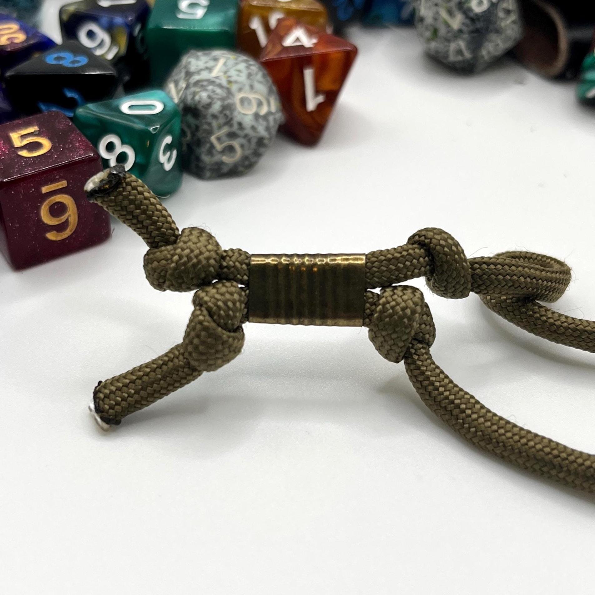 Handcrafted leather dice bag with drawstring, ideal for storing RPG dice sets. Perfect for DnD, tabletop games, or as a fantasy gift for gamers.