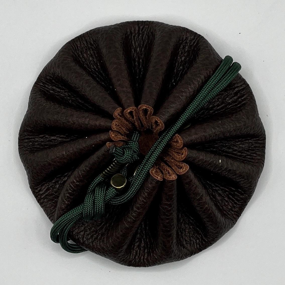 Handcrafted leather dice bag with drawstring, ideal for storing RPG dice sets. Perfect for DnD, tabletop games, or as a fantasy gift for gamers.