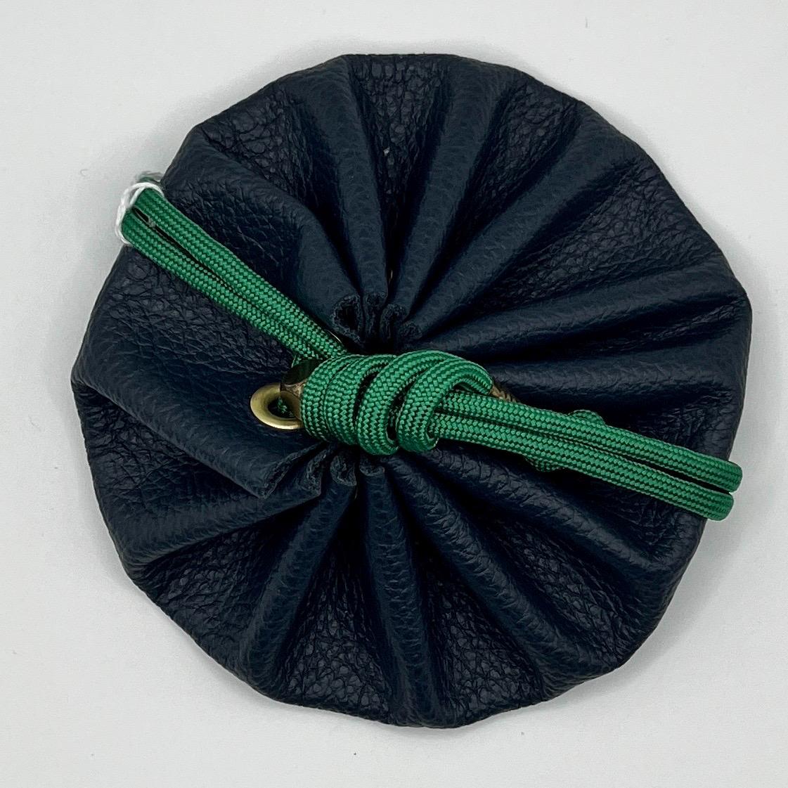 Handcrafted leather dice bag with drawstring, ideal for storing RPG dice sets. Perfect for DnD, tabletop games, or as a fantasy gift for gamers.