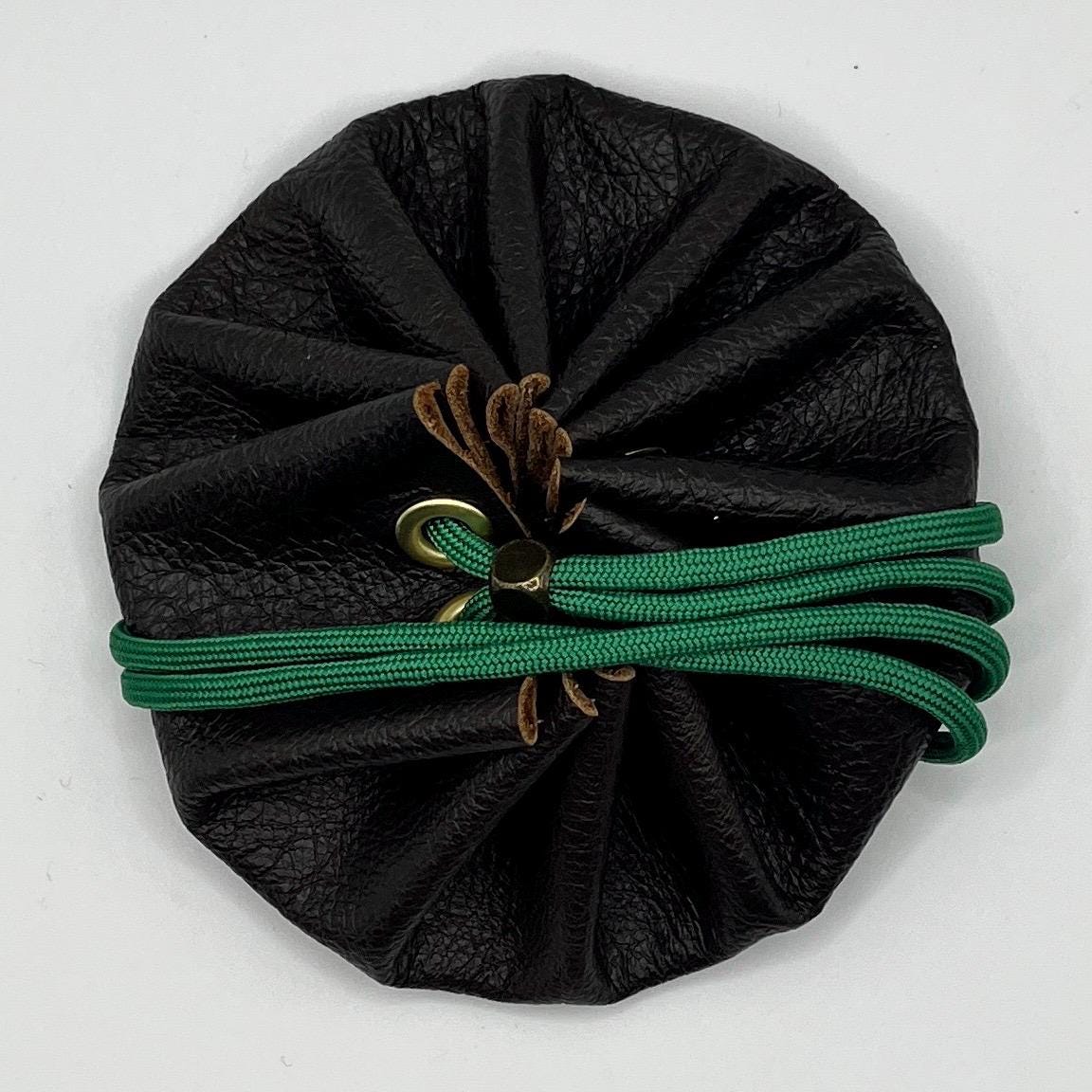 Handcrafted leather dice bag with drawstring, ideal for storing RPG dice sets. Perfect for DnD, tabletop games, or as a fantasy gift for gamers.