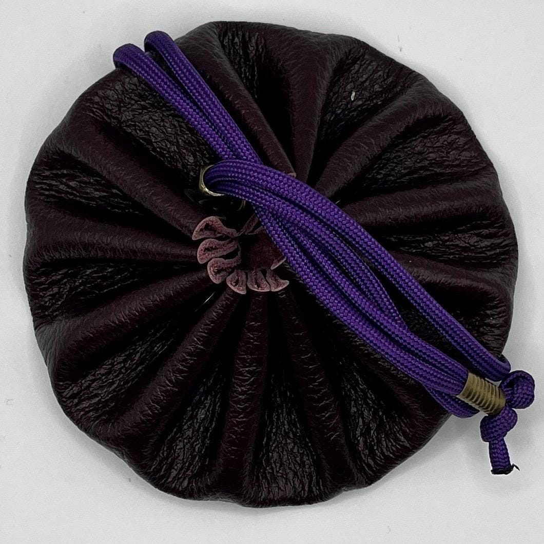 Handcrafted leather dice bag with drawstring, ideal for storing RPG dice sets. Perfect for DnD, tabletop games, or as a fantasy gift for gamers.