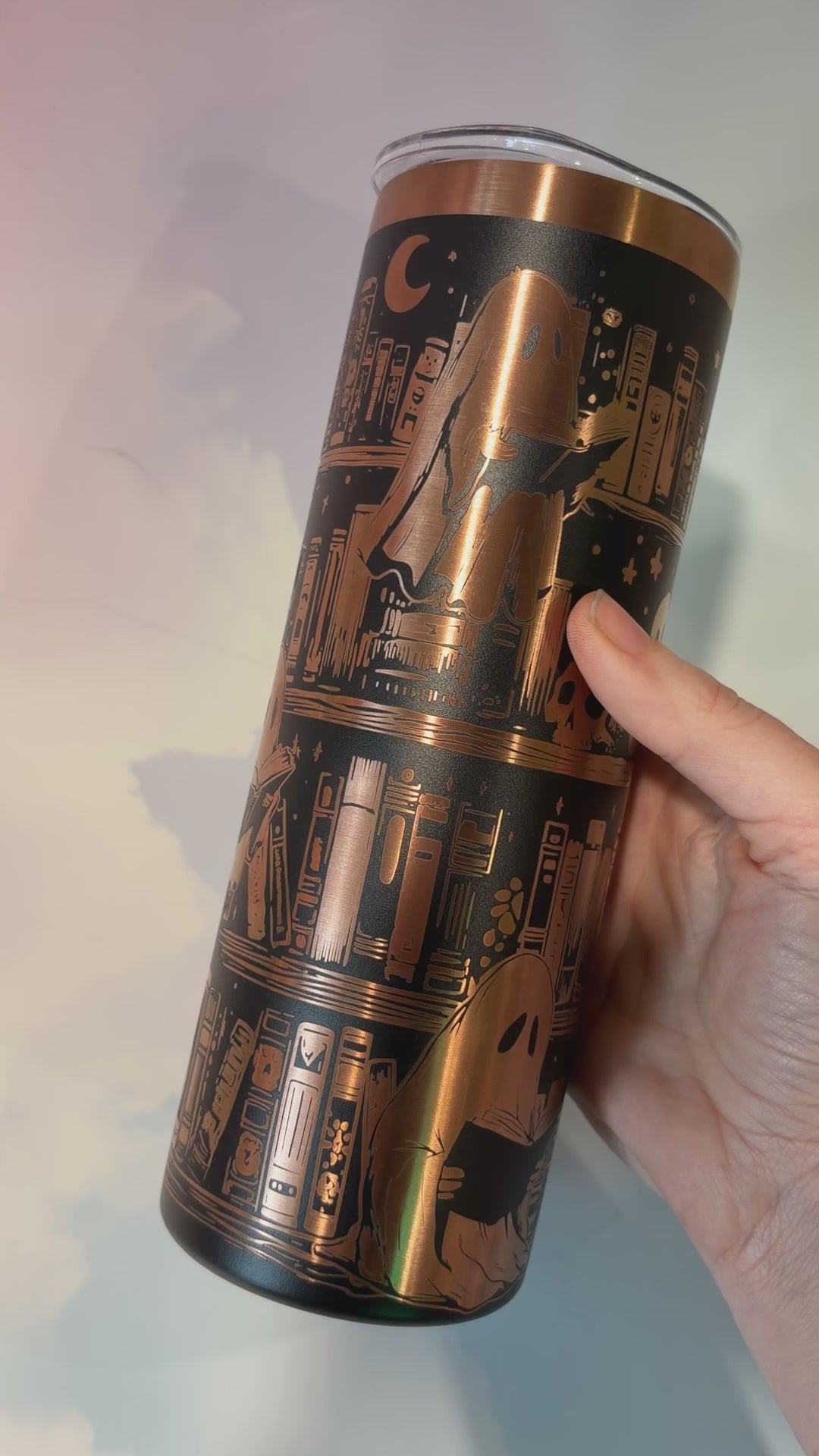 20oz laser engraved skinny tumbler featuring Halloween books, ghosts, bats, and spiderwebs. Perfect spooky drinkware for witchy book lovers and gothic décor fans.