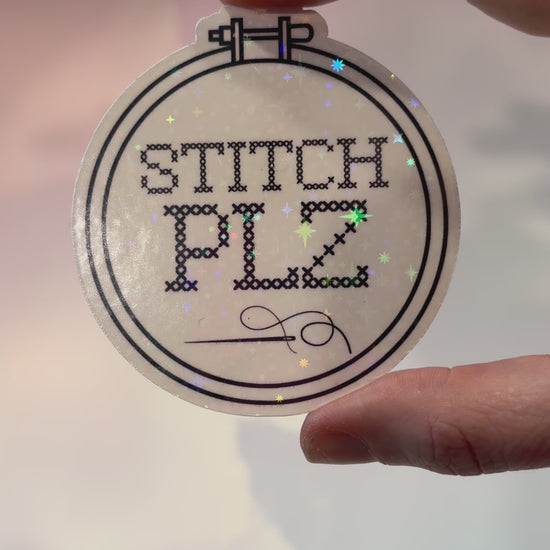 Black and white holographic vinyl sticker featuring a cross stitch hoop with the phrase "STITCH, PLZ," weather and water resistant.