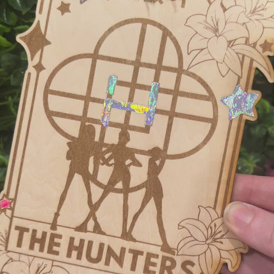 Laser engraved wood tarot card with holographic silver foil accents featuring Huntrix as The Hunters from KPOP Demon Hunters. A unique witchcore art piece for tarot and KPOP lovers alike.