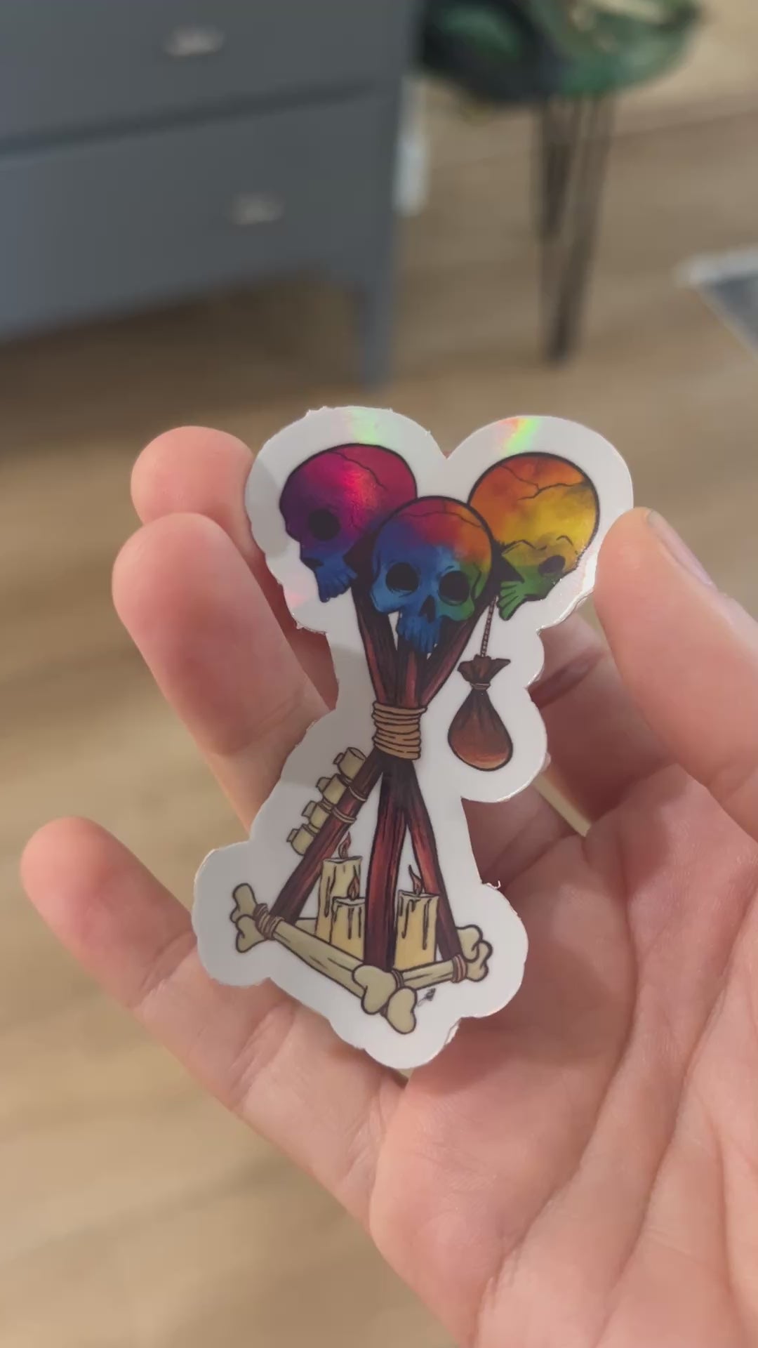 Holographic Dead by Daylight Totem Sticker featuring a skull totem design. Perfect for horror gamers and fans of DBD, this unique gaming decal adds a spooky flair to any collection. Durable and eye-catching, great for laptopsand accessories.