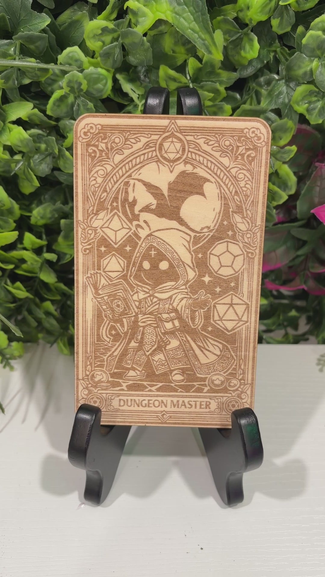 Laser engraved 3mm basswood tarot cards featuring a Dungeon Master class design from Dungeons and Dragons. Intricate fantasy artwork with dice, magic symbols, and ornate gothic detailing.