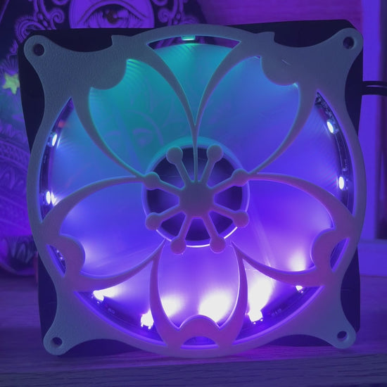Decorative PC fan cover featuring an 80s tropical palm tree design with a black textured finish. Perfect for adding a unique and stylish touch to gaming or custom PC builds, blending functionality with aesthetic flair.
