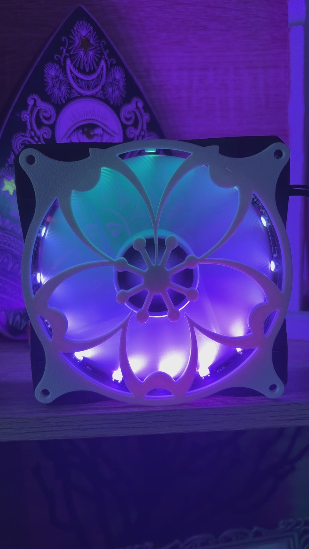 Decorative PC fan cover featuring an 80s tropical palm tree design with a black textured finish. Perfect for adding a unique and stylish touch to gaming or custom PC builds, blending functionality with aesthetic flair.