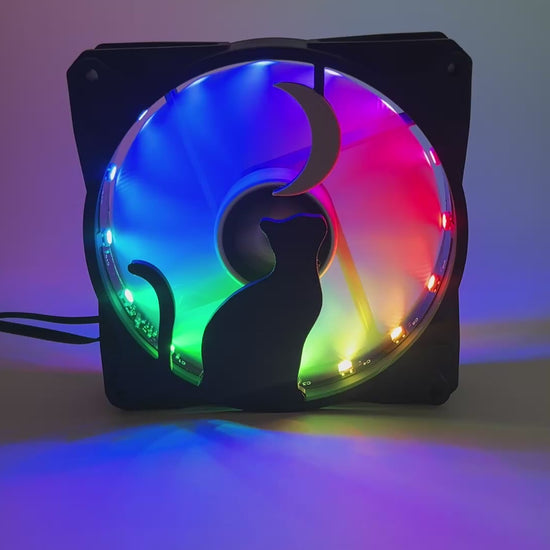 3D printed PC fan grill with a silhouette of a cat gazing at the moon. Perfect for whimsical gaming setups and cat lovers who love custom tech.