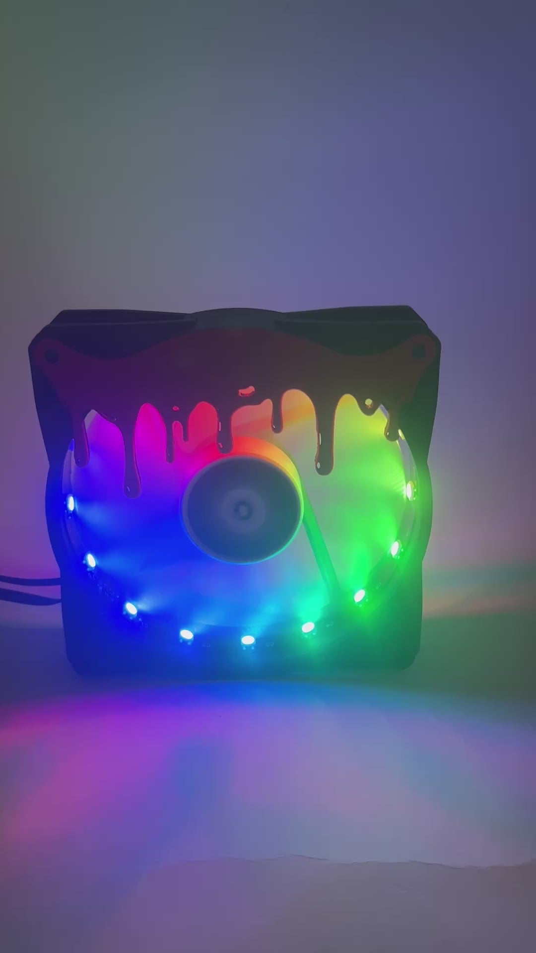 3D printed blood drip fan grill for PC case mods. Adds spooky horror vibes to any gaming setup. Perfect for Halloween or creepy gamer aesthetics.