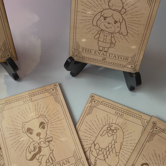 Laser-engraved wooden tarot cards featuring Animal Crossing Characters. Perfect for gamers, tarot lovers, and collectors. Cottagecore, cozy gaming decor.