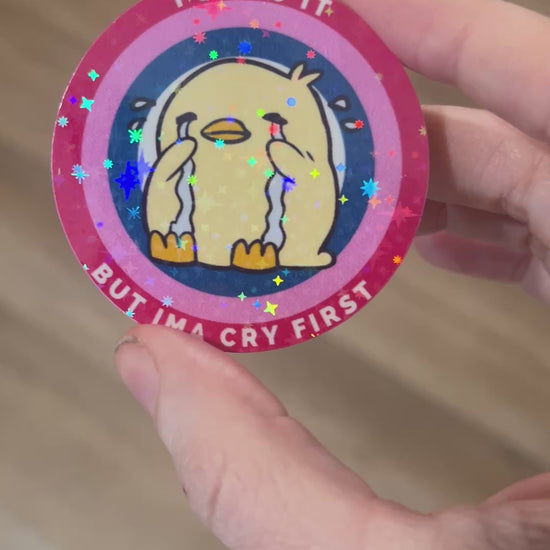 Cute holographic vinyl sticker of a cartoon duck with tears and the phrase “I’ll Do It But I’mma Cry First,” perfect for laptops, water bottles, and journals.