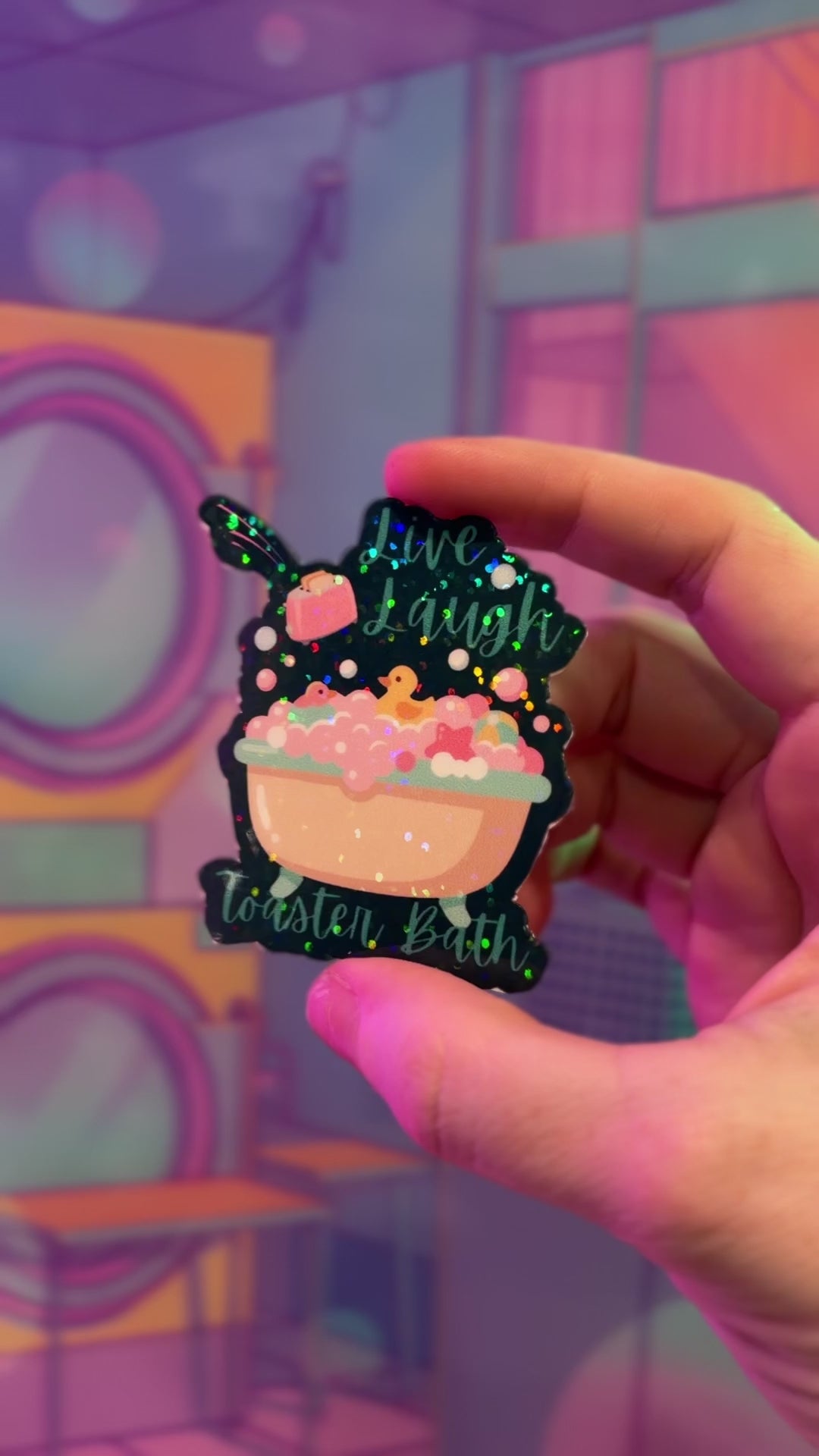 Holographic Live Laugh Toaster Bath vinyl sticker with bathtub, bubbles, rubber duck, and flying toaster.
