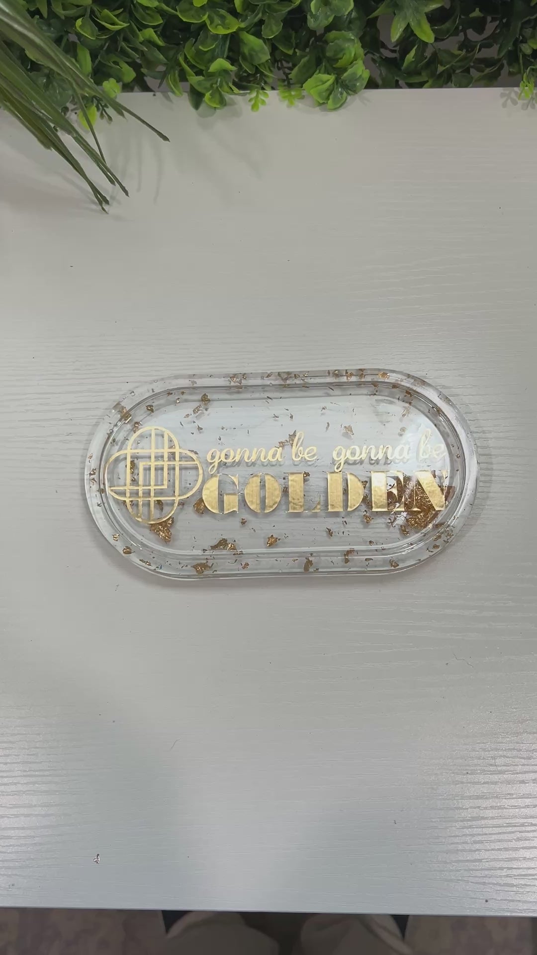 Handmade resin trinket tray with gold leaf and the quote “Gonna Be Gonna Be Golden.” Kpop Demon Hunters–inspired jewelry dish, perfect for gifts or décor.