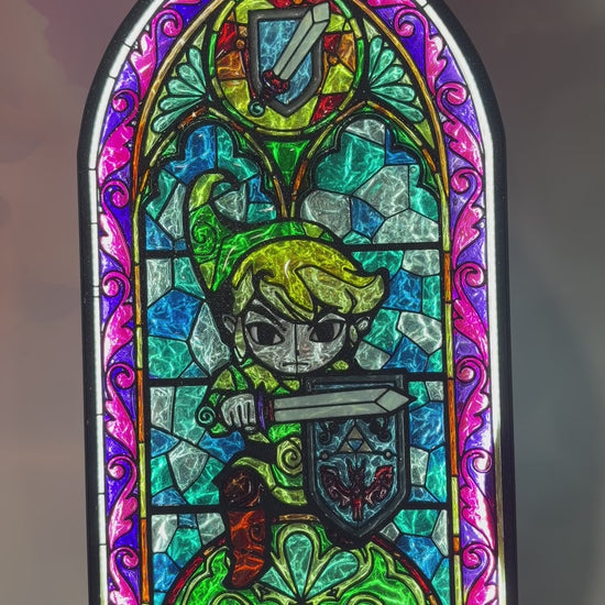 Handmade Zelda-inspired stained glass window light featuring hand-tinted resin artwork in a 3D printed frame with glowing interior LED lighting.