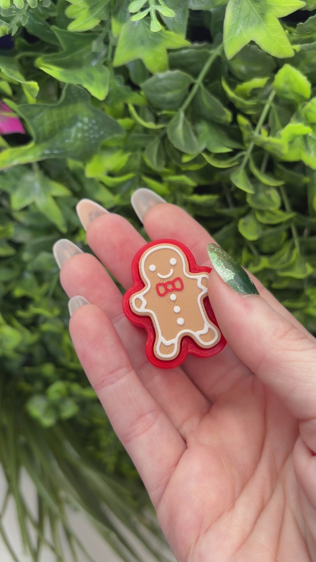 Holiday gingerbread fidget clicker toy.