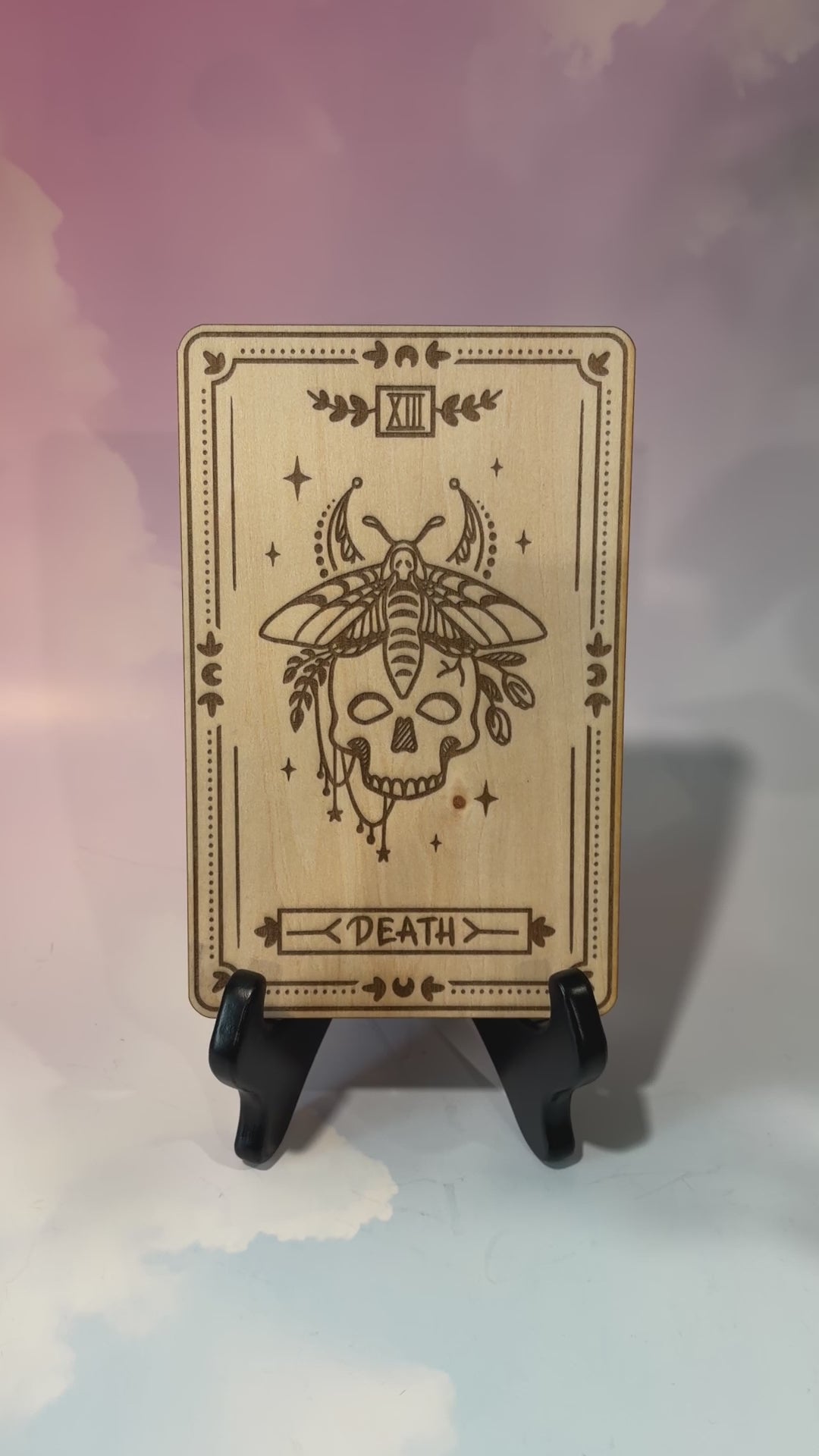Laser-engraved wooden tarot card made from 3mm basswood, approximately 7 x 5 inches. Available in all 22 Major Arcana designs with customizable colors and an optional display stand for an additional $2.
