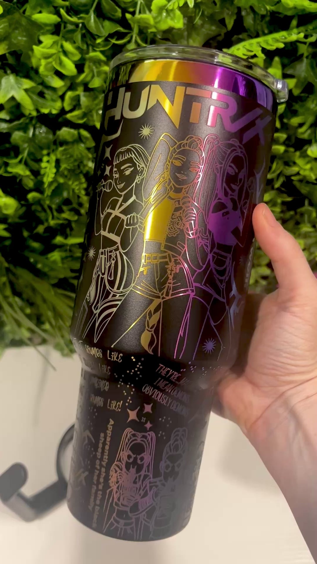 Laser engraved 40oz stainless steel tumbler with handle and straw featuring KPOP Demon Hunters design. Durable fandom drinkware for gamers and fans.