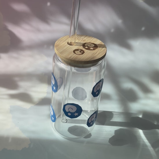 Glass tumbler with bamboo lid featuring Animal Crossing inspired fossil designs.