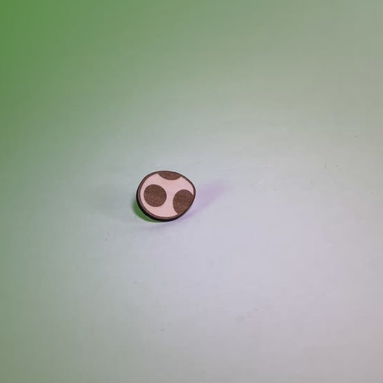 A laser engraved wood pin shaped like a Yoshi Egg. Lightweight and handmade, perfect for gamers, retro lovers, or anyone into cute and geeky accessories.