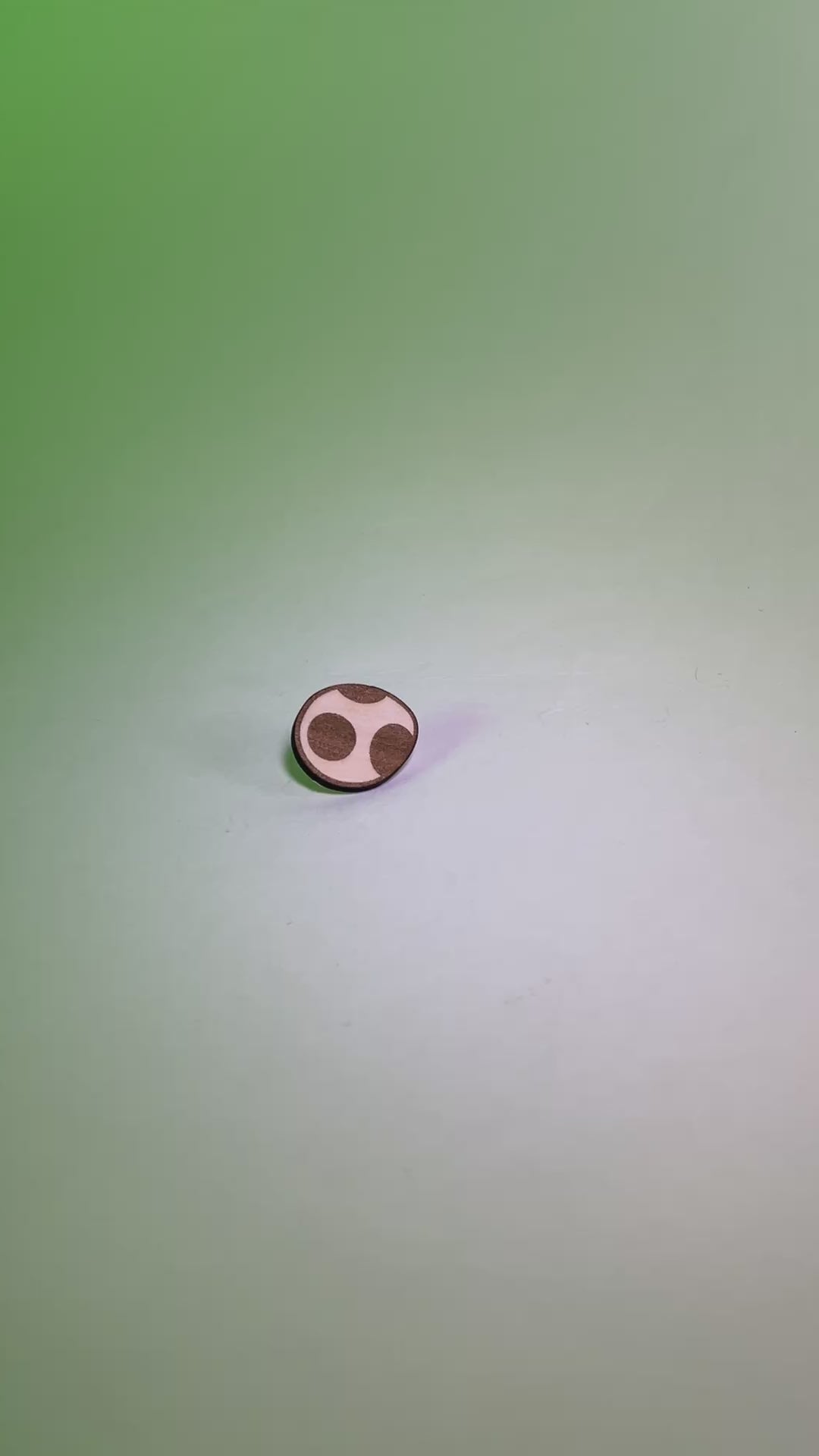 A laser engraved wood pin shaped like a Yoshi Egg. Lightweight and handmade, perfect for gamers, retro lovers, or anyone into cute and geeky accessories.