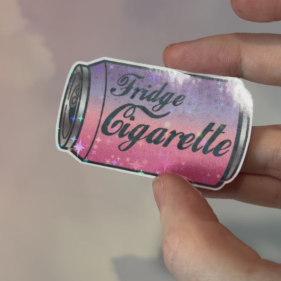Holographic water-resistant vinyl sticker featuring a soda can with the phrase “Fridge Cigarette” in bold lettering.