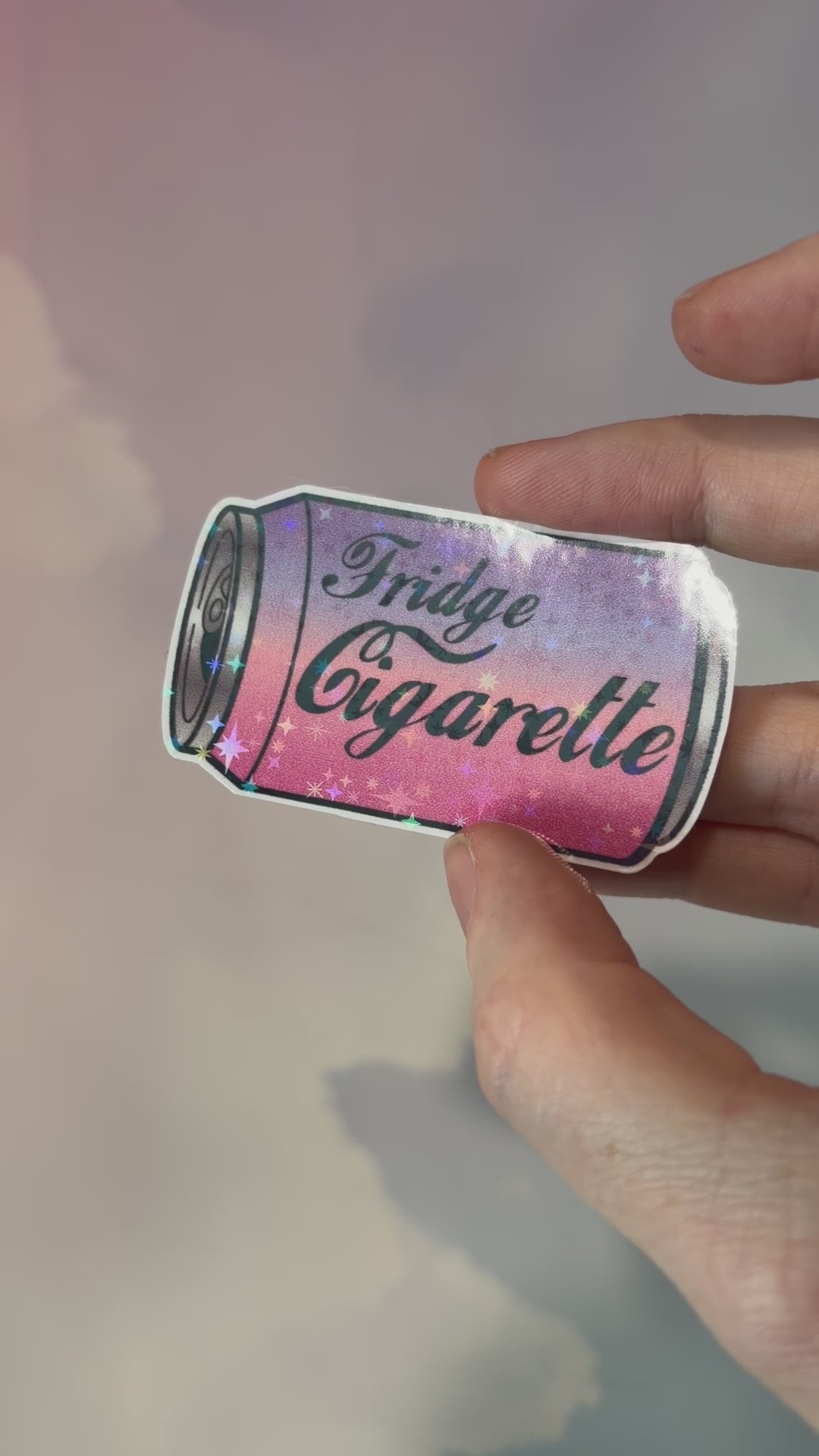 Holographic water-resistant vinyl sticker featuring a soda can with the phrase “Fridge Cigarette” in bold lettering.