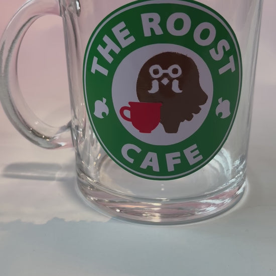 Glass coffee cup with Roost Café inspired vinyl logo.