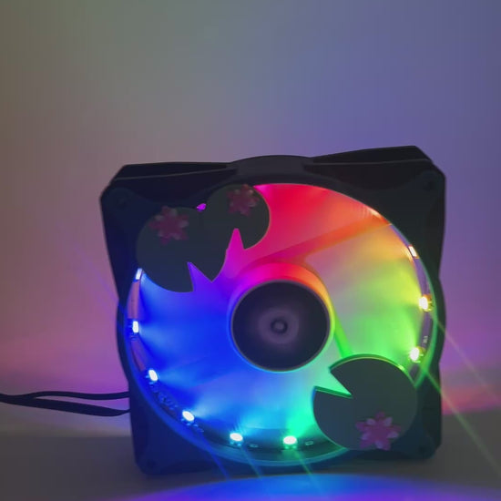 Adorable 3D printed PC fan grill with lily pad and lotus flower design. A cute nature-inspired fan cover perfect for cozy, aesthetic gaming setups.