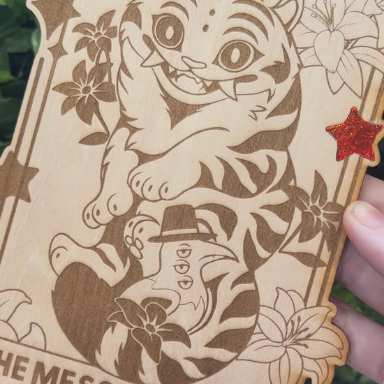 Wooden tarot card with blue and orange foil accents engraved with Derpy Tiger as The Messengers from KPOP Demon Hunters. Whimsical design with a magical, mystical twist.