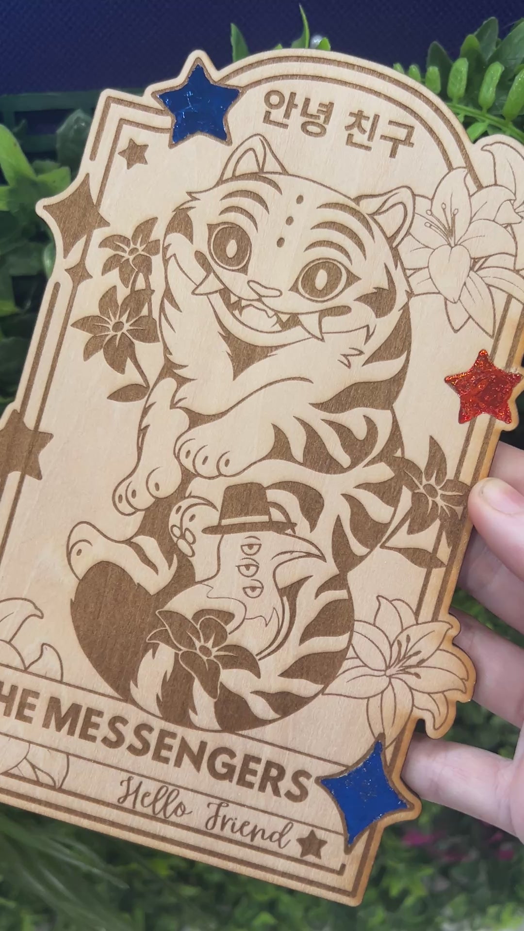 Wooden tarot card with blue and orange foil accents engraved with Derpy Tiger as The Messengers from KPOP Demon Hunters. Whimsical design with a magical, mystical twist.